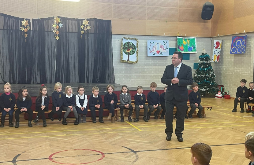 Craig Hoy MSP at St Marys RC Primary School assembly announcing the result of his Christmas Card Contest