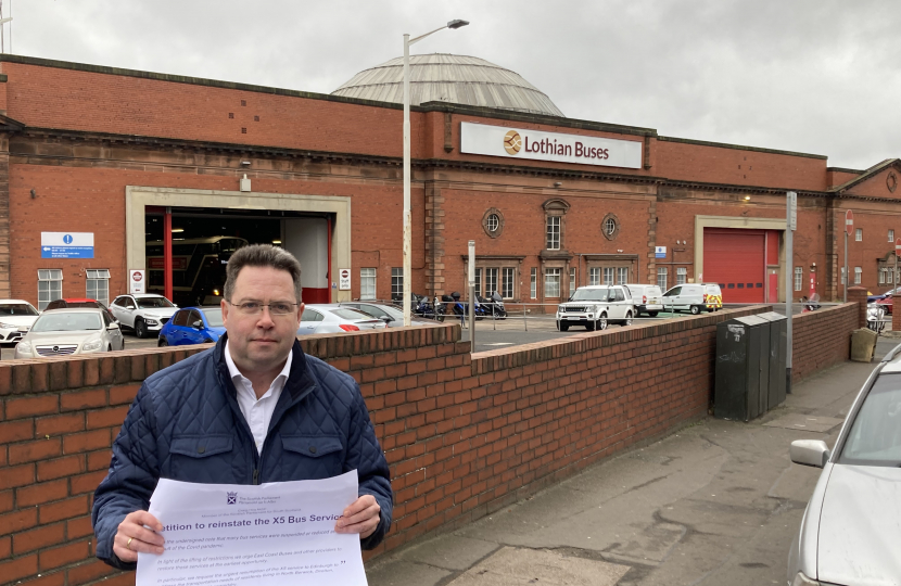 Craig Hoy MSP handing in his petition to reinstate the suspended X5 bus