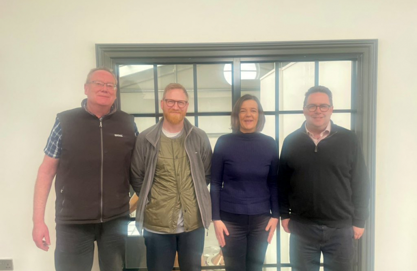 (left-to-right) Steve Ross, Managing Director of NB Gin; Jamie MacDonald, head of the NB Gin's Rum Project; Jenny Martin, Customer Relations Manager; and Craig Hoy MSP