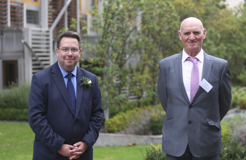 Craig Hoy MSP and local hero Rab Moran at the state opening of the Scottish Parliament in October 2021