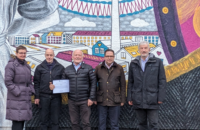 (left-to-right) Angela Crow (Manager); Jonathan Andrews (Treasurer); Ian Dalgleish (Chair); Craig Hoy MSP; and Mike Gray (Former Chair)