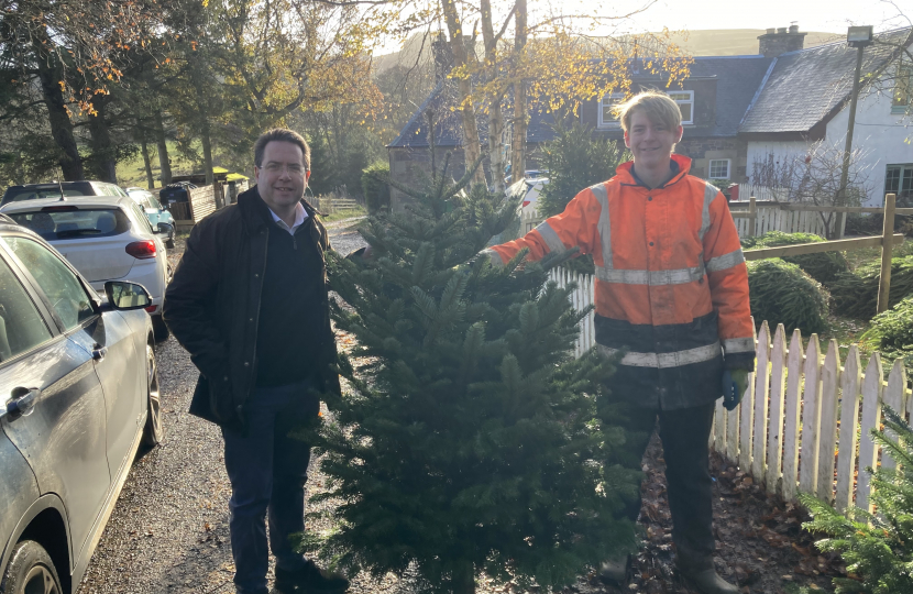 Craig and Oliver McVicker from Rhymer Glen Trees picking out Christmas Tree for Tweeddale Youth Action