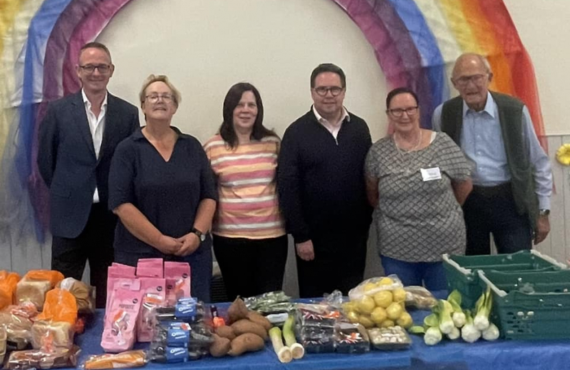 John Lamont MP and Craig Hoy MSP with volunteers from Earlston Community Larder.jpg