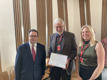 Craig Hoy MSP, David Habgood and his daughter Elizabeth Doig