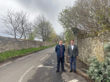 Cllr Lachlan Bruce (left) and Craig Hoy MSP (right) at Johnnie Cope's Road