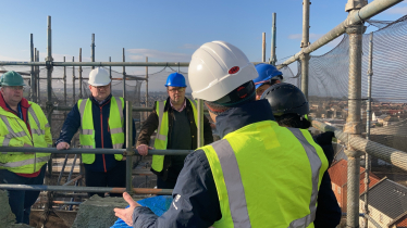 Craig and Cllr Lachlan Bruce chatting on scaffold