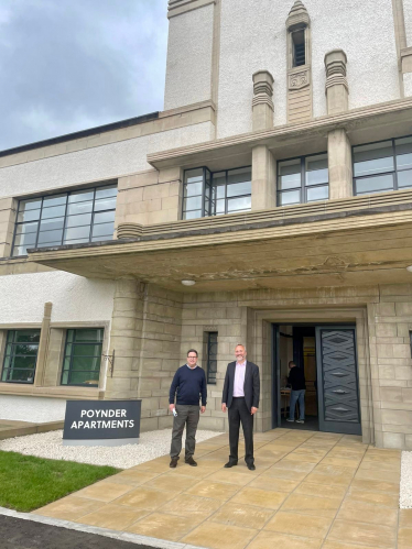 Craig Hoy MSP outside of Poynder Apartments in Kelso with Nile Istephan (Chief Executive of Eildon)