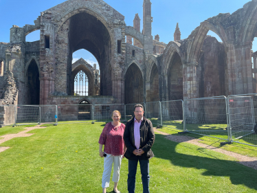 Cllr Linehan and Craig Hoy MSP outside of Melrose Abbey